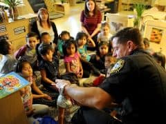 FF reading a book to kids